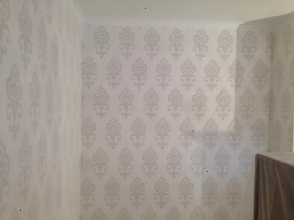 Tapissage et mise en peinture d’un appartement à Ottignies